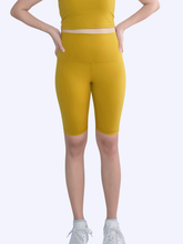 Load image into Gallery viewer, Energy Biker Shorts 9&quot; in Butter
